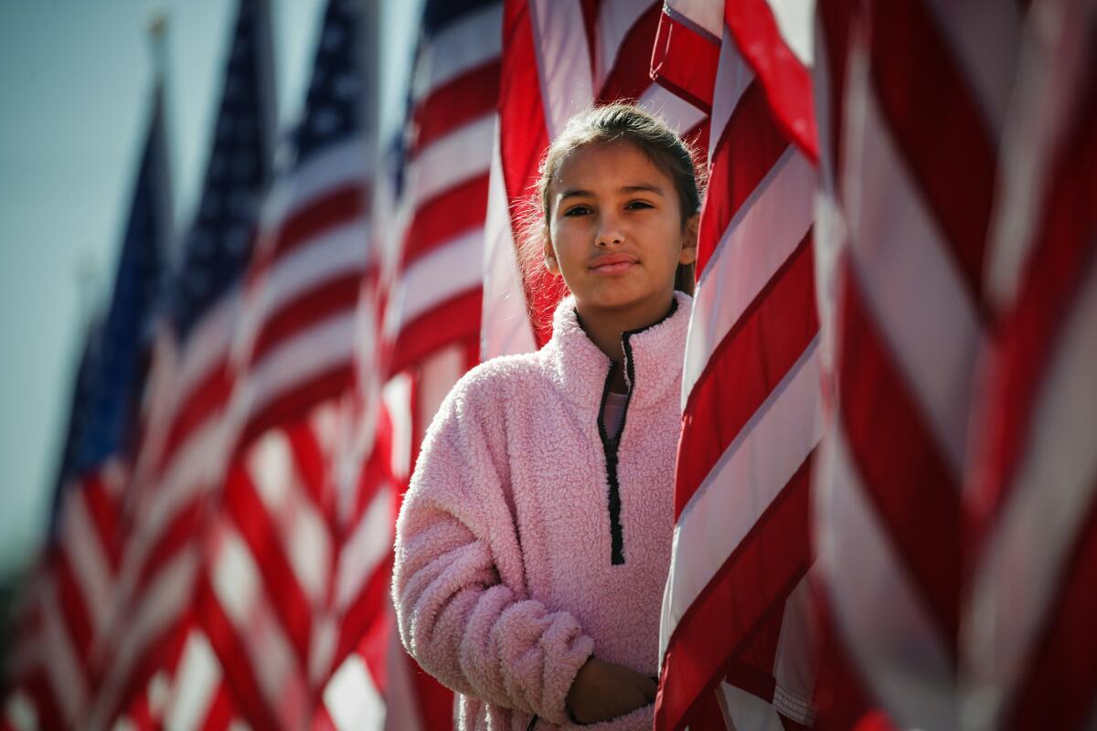 A 10-year-old girl visits Covina's Field of Valor.