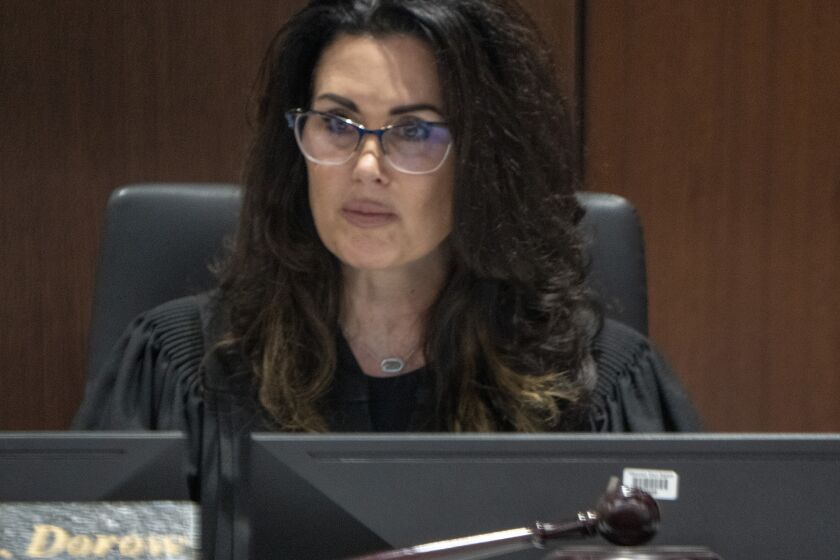 Judge Jennifer R. Dorow presides over a hearing for Darrell Brooks Jr. Friday, Aug. 26, 2022 in Waukesha County Court in Waukesha, Wis. Judge Dorow said Monday, Nov. 28, 2022 that she will make a decision on whether to run for the Wisconsin Supreme Court “in the coming days.” (Mark Hoffman/Milwaukee Journal-Sentinel via AP, Pool)