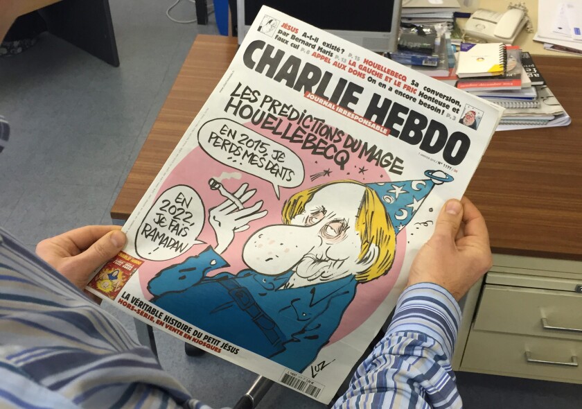 The latest issue of French satirical magazine Charlie Hebdo, where 12 people were shot and killed Wednesday, features controversial French novelist Michel Houellebecq.