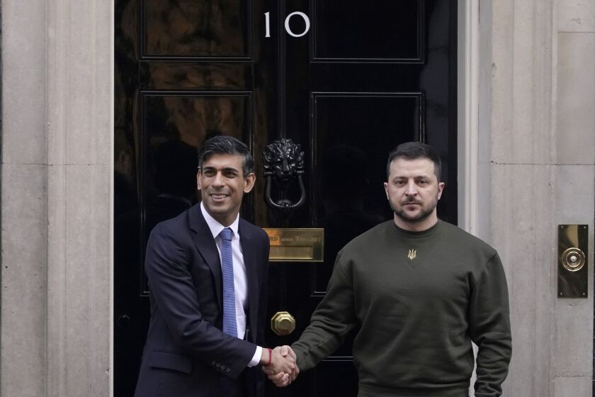 Britain's Prime Minister Rishi Sunak, left, welcomes Ukraine's President Volodymyr Zelenskyy at Downing Street in London, Wednesday, Feb. 8, 2023. It is the first visit to the UK by the Ukraine President since the war began nearly a year ago. (AP Photo/Alberto Pezzali)
