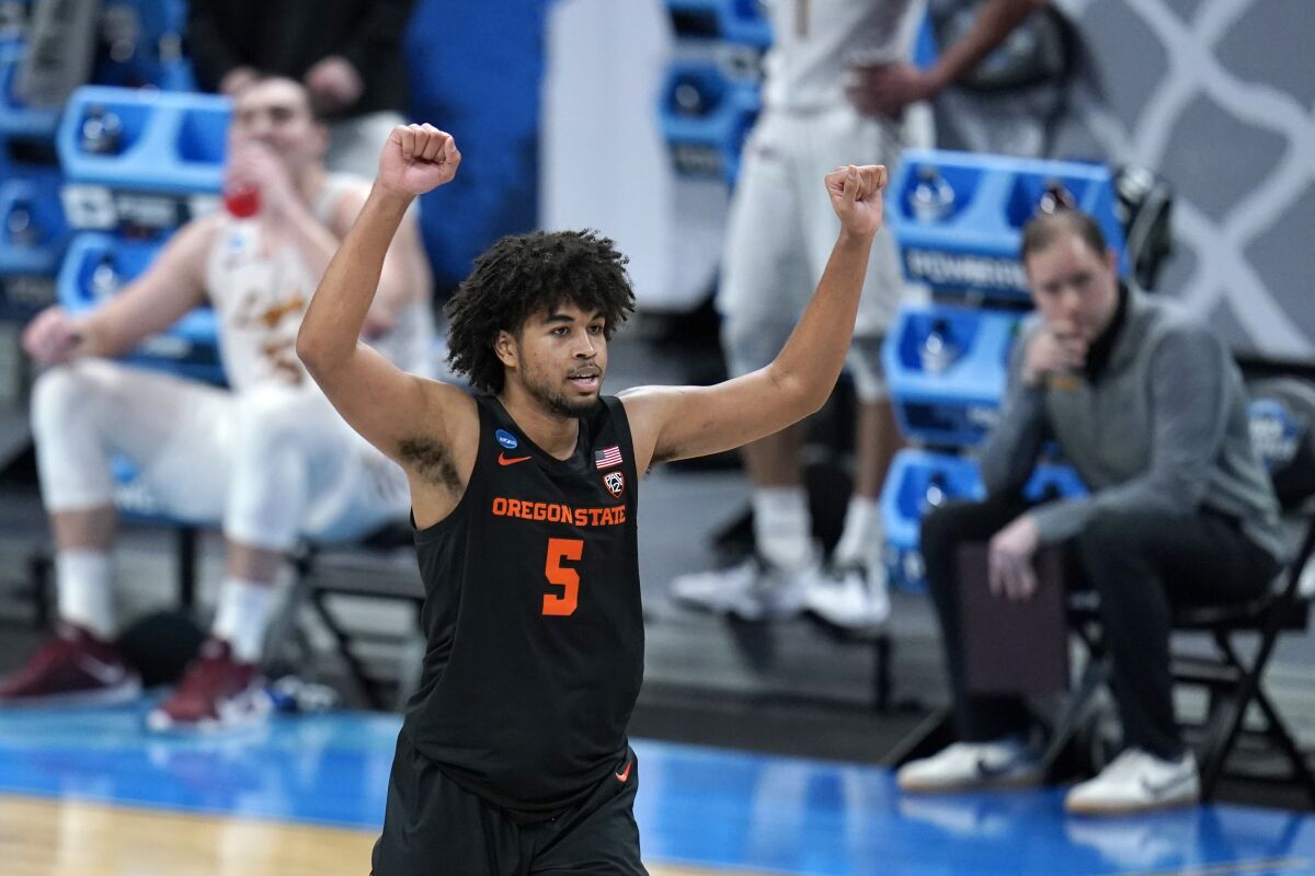 Oregon State guard Ethan Thompson celebrates during the second half of a Sweet 16 game against Loyola Chicago.