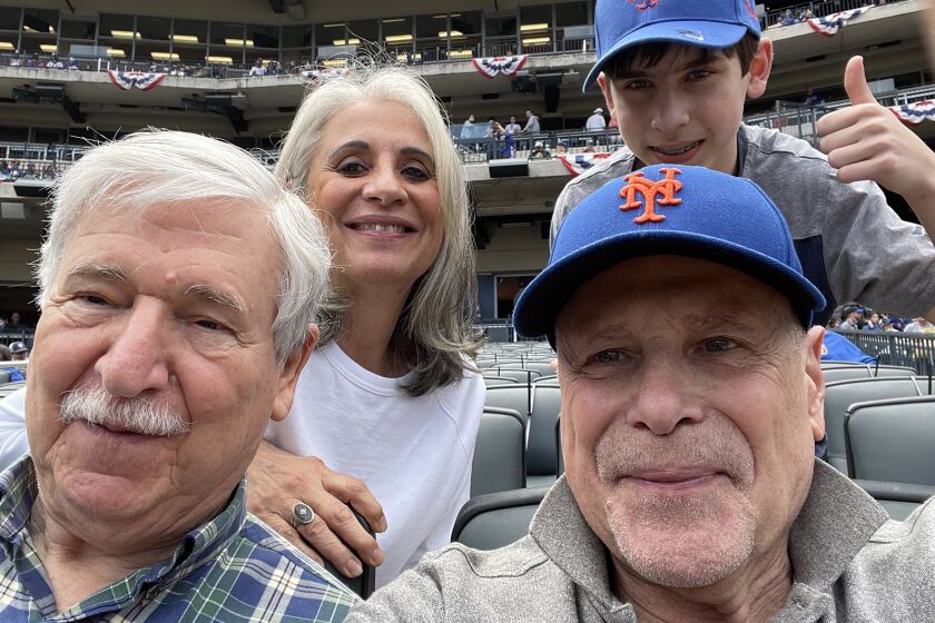 Citifield NEW YORK, NY APRIL 10, 2021-(l to r) Returned Iranan Hostage John Limbert, Barbara Rosen, returned Iran hostage Barry Rosen and John Limbert's 14 year old grandson Otto, met during a capacity-restricted game in a pandemic, teh Mets lost to the miami marlins 3 - 0 .