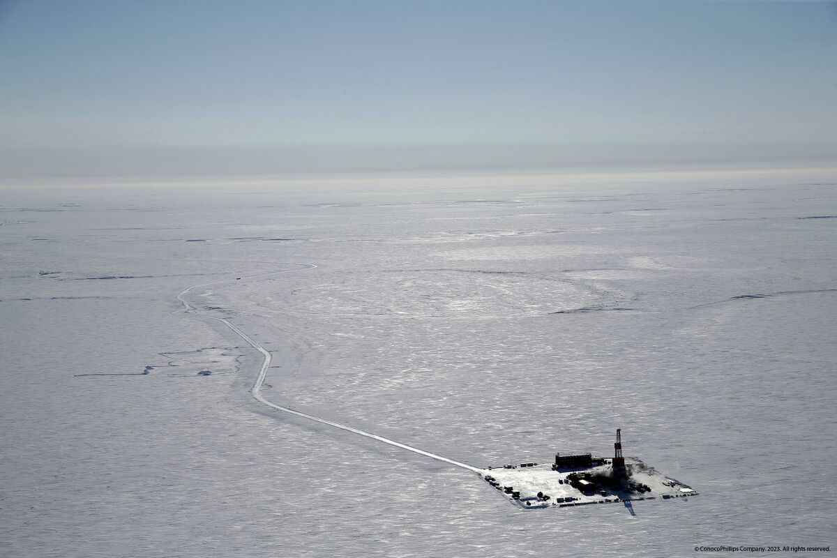 FILE - This 2019 aerial photo provided by ConocoPhillips shows an exploratory drilling camp at the proposed site of the Willow oil project on Alaska's North Slope. The Biden administration issued a long-awaited study on Wednesday, Feb. 1, 2023, that recommends allowing three oil drilling sites in the region of far northern Alaska. The move, while not final, has angered environmentalists who see it as a betrayal of President Joe Biden's pledges to reduce carbon emissions and promote green energy. (ConocoPhillips via AP)