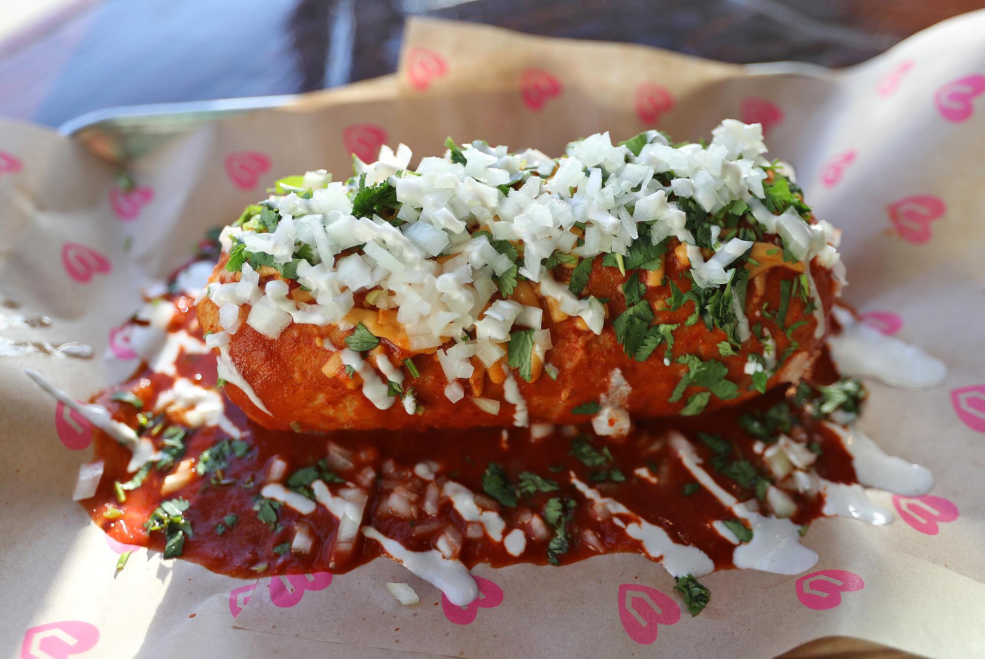 A classico burrito smothered in red sauce at Chicana Plant-based Grub in Fullerton.