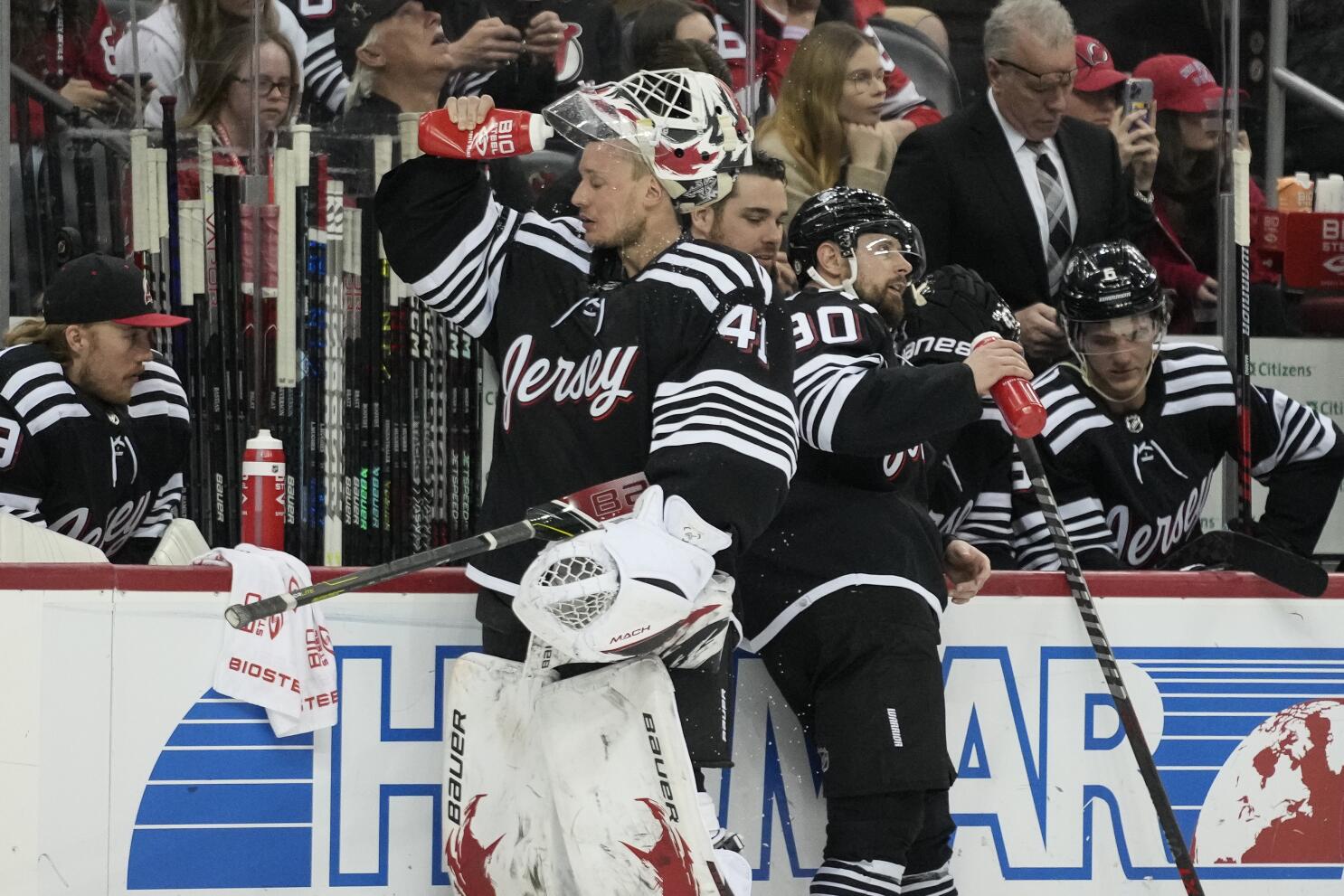 New Jersey Devils hold off defending Stanley Cup champion