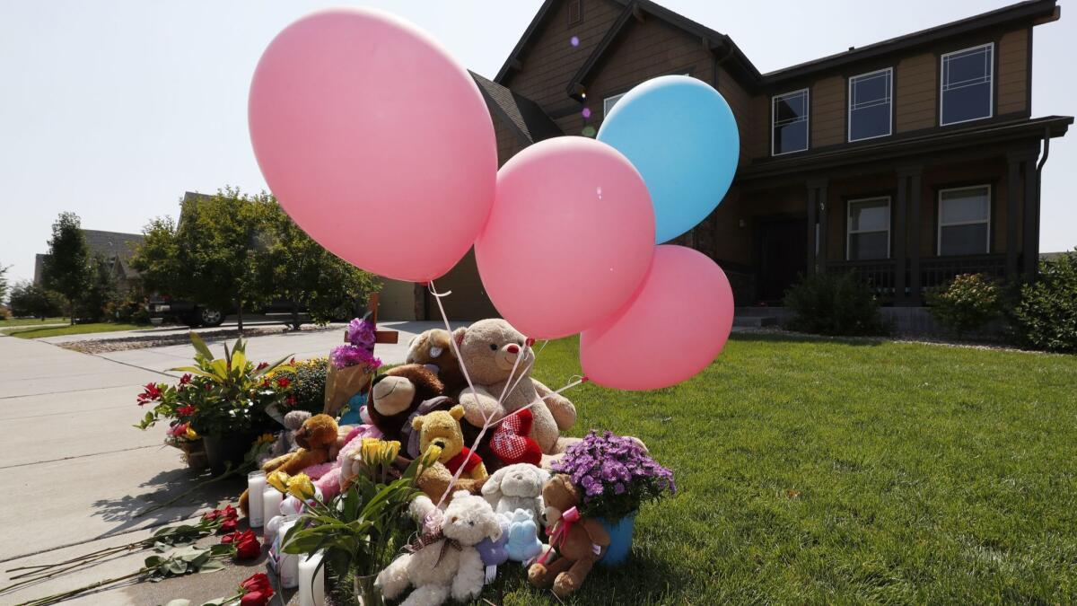 A makeshift memorial outside the Watts family home in Frederick, Colo.