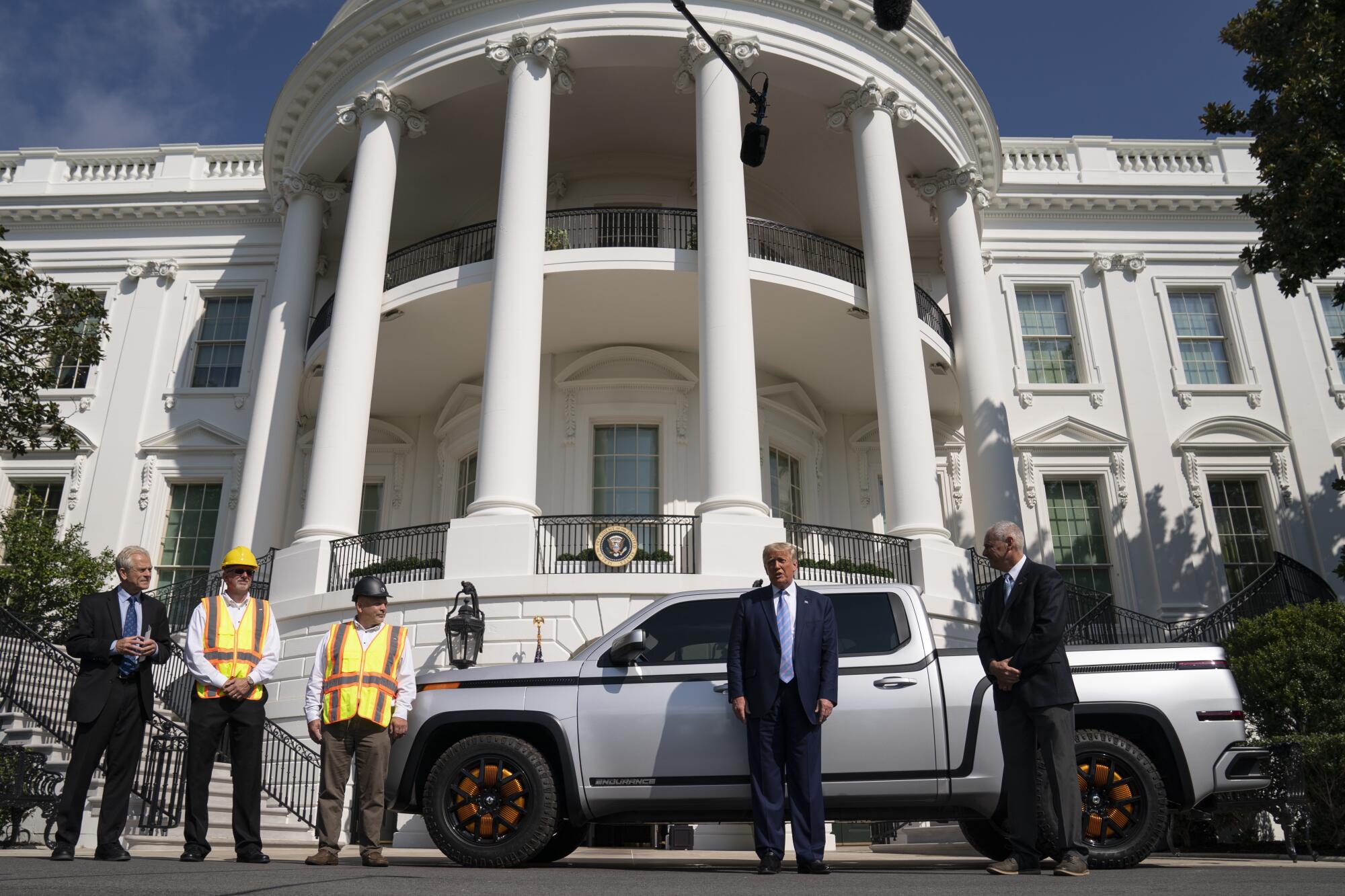 Lordstown Motors Chief Executive Steve Burns shows President Trump the Endurance all-electric pickup truck