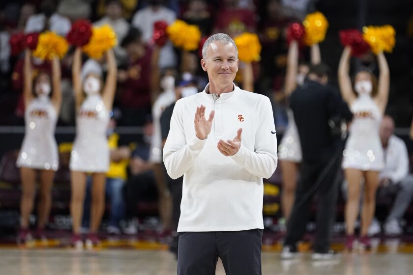 Southern California head coach Andy Enfield stands on the court before an NCAA college basketball game against Washington State Sunday, Feb. 20, 2022, in Los Angeles. (AP Photo/Marcio Jose Sanchez)