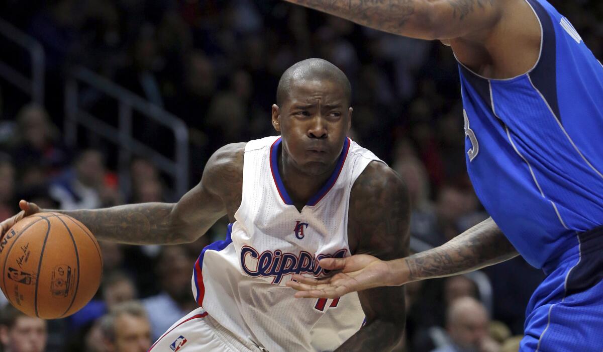 Clippers guard Jamal Crawford drives against Mavericks forward Charlie Villanueva during a game earlier this season.