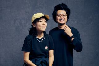 Actress Park Ji-Min, left and writer and director Davy Chou, with the film, "Return To Seoul,"