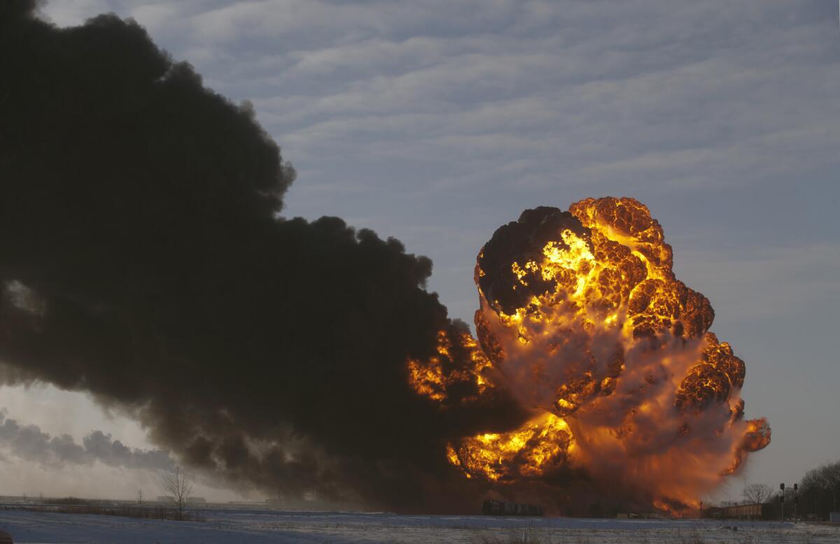 A fireball goes up at the site of an oil train derailment in Casselton, N.D., in this Dec. 30 photo.