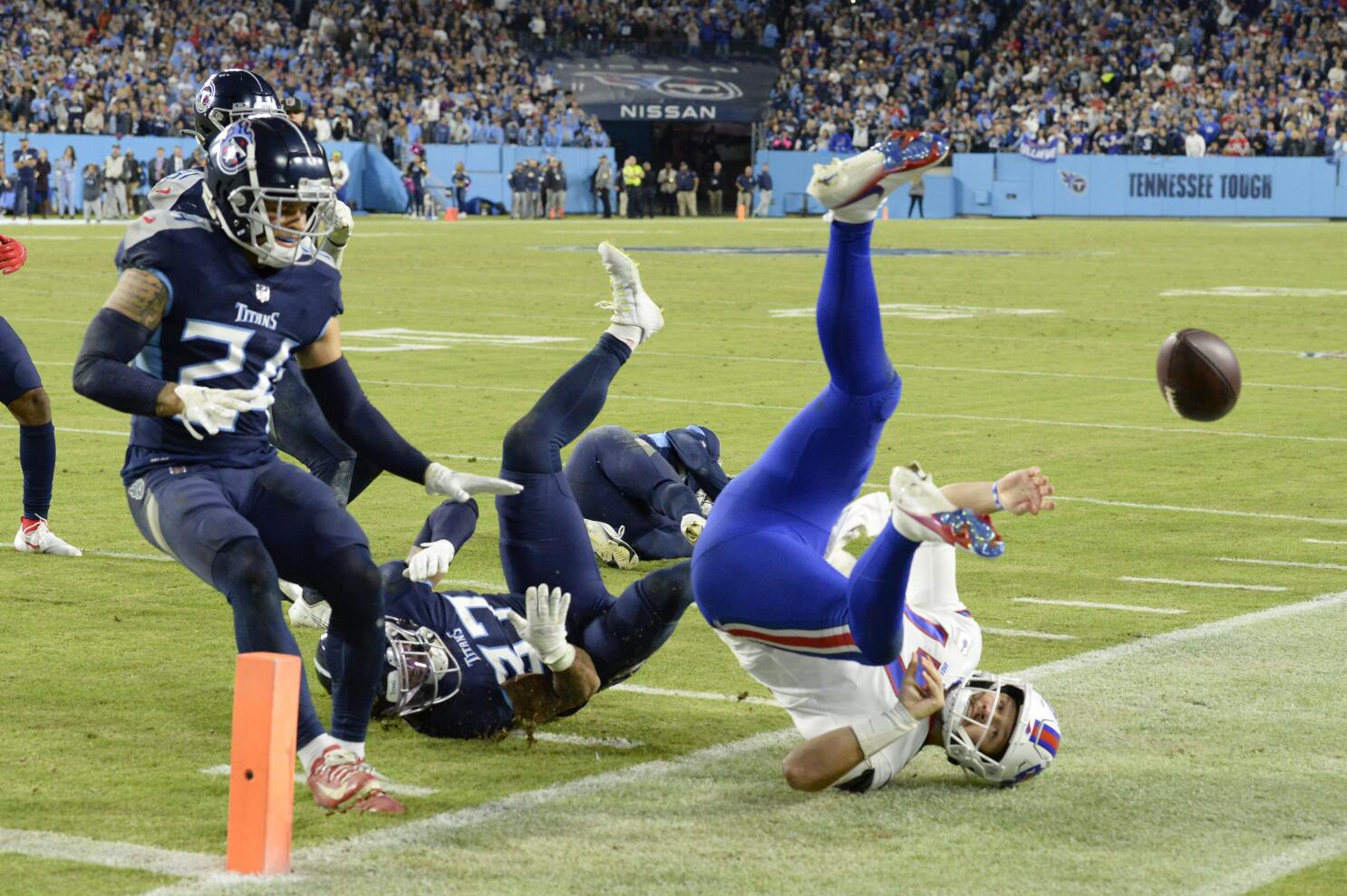 Titans stop Allen on 4th down, hang on to beat Bills 34-31