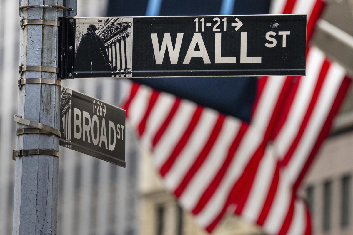 A sign for Wall Street near the New York Stock Exchange.