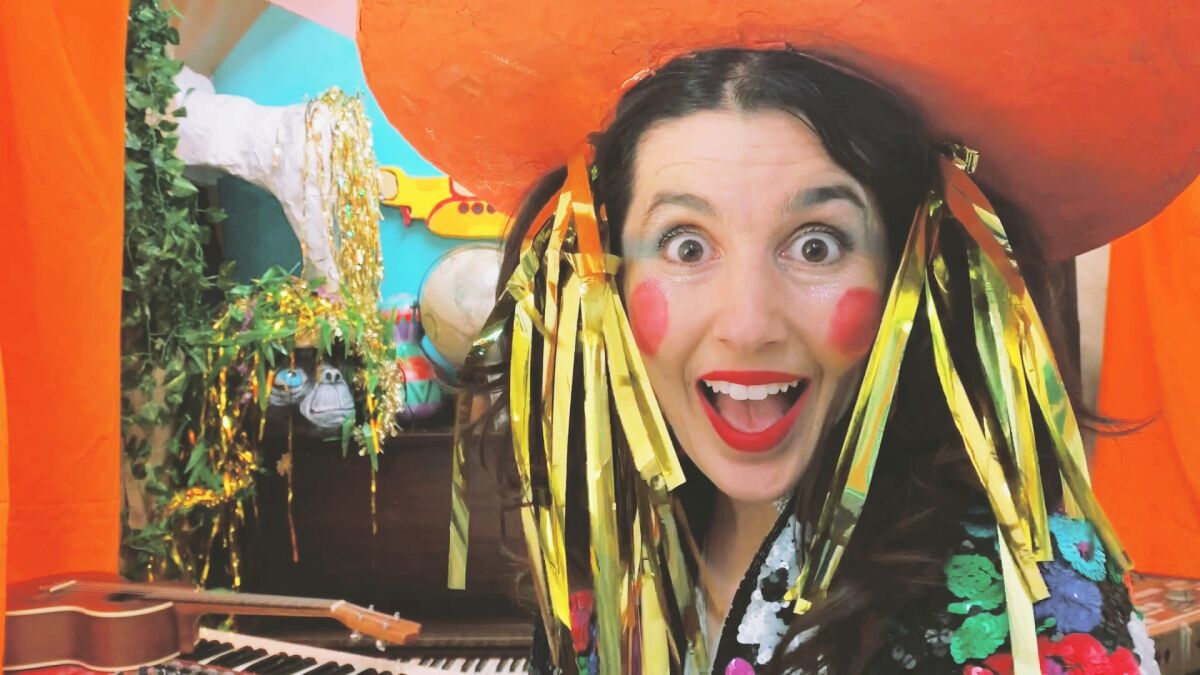 Natasha Kozaily, owner of Kalabash School of Music and the Arts, dresses up as "Miss Nati" to create educational lessons for kids about musical artists.