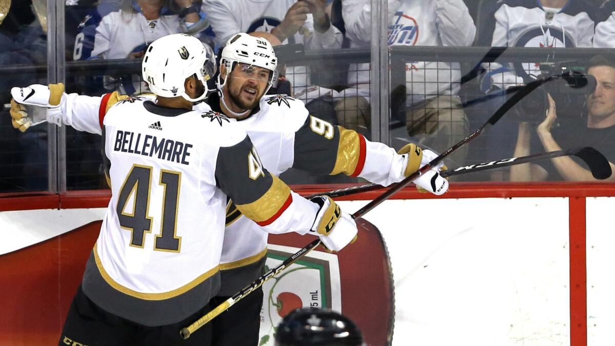 Tomas Tatar is congratulated by Pierre-Edouard Bellemare after scoring a goal against Winnipeg on May 14.