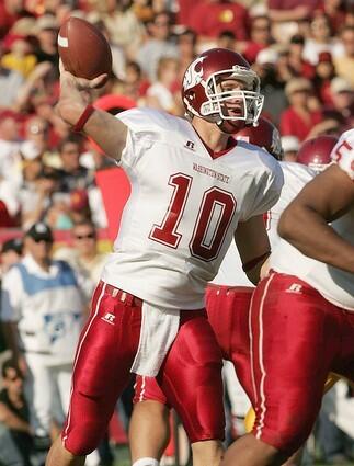 Quarterback Alex Brink of the Washington State Cougars throws a pass against USC.