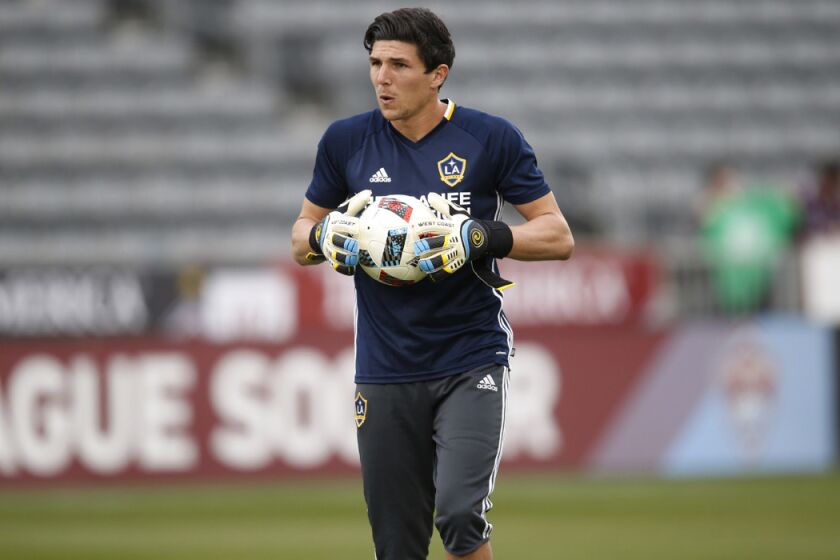 Los Angeles Galaxy goalkeeper Brian Rowe plays in the first half of a soccer game on March 12.
