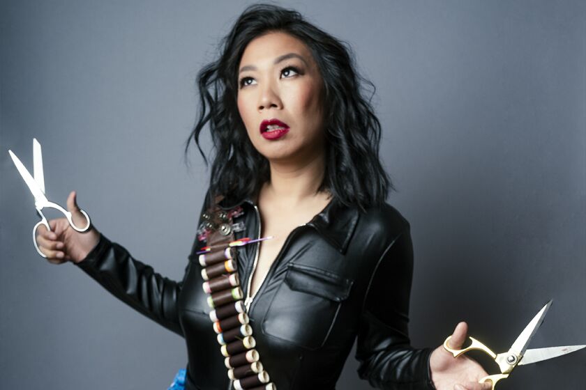 Kristina Wong, in her play "Kristina Wong, Sweatshop Overlord."