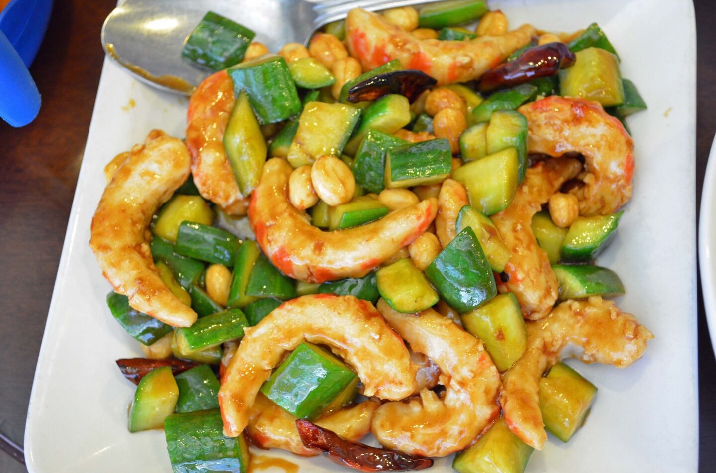 Kung pao "shrimp" made with cold cucumber slices, peanuts and chiles from Vege Paradise.