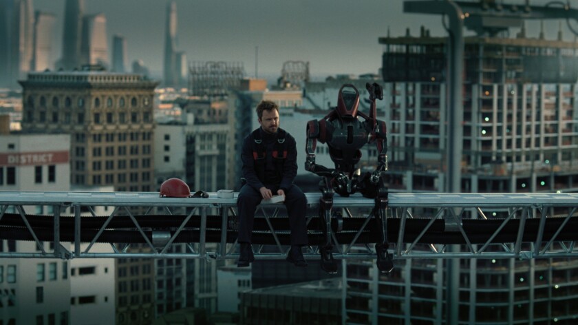 Aaron Paul and his robot co-worker in "Westworld."