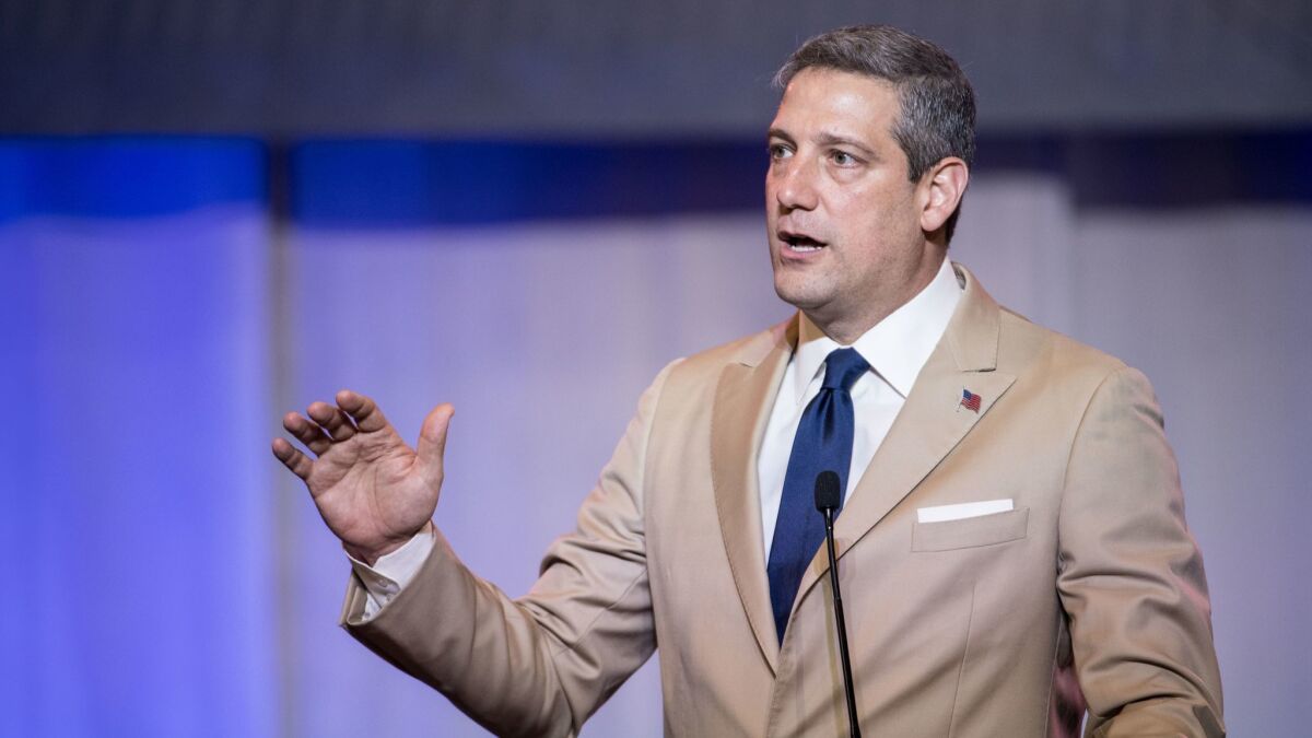 Tim Ryan, a moderate, promotes working with business rather than focusing on income inequality, and suggests yoga and meditation for troubled veterans.