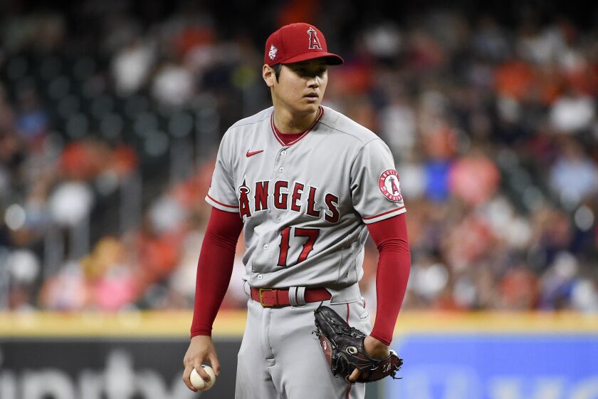 Los Angeles Angels starting pitcher Shohei Ohtani stands on the mound during the first inning of a baseball game against the Houston Astros, Friday, Sept. 10, 2021, in Houston. (AP Photo/Eric Christian Smith)