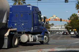 San Diego, CA - February 1: A big rig drives along Harbor Drive in Barrio Logan on Wednesday, February 1, 2023. A deal between the Port of San Diego and Mitsubishi Cement Corp. for a storage facility at the 10th Avenue Marine Terminal has fallen through, officials announced Wednesday. (K.C. Alfred / The San Diego Union-Tribune)