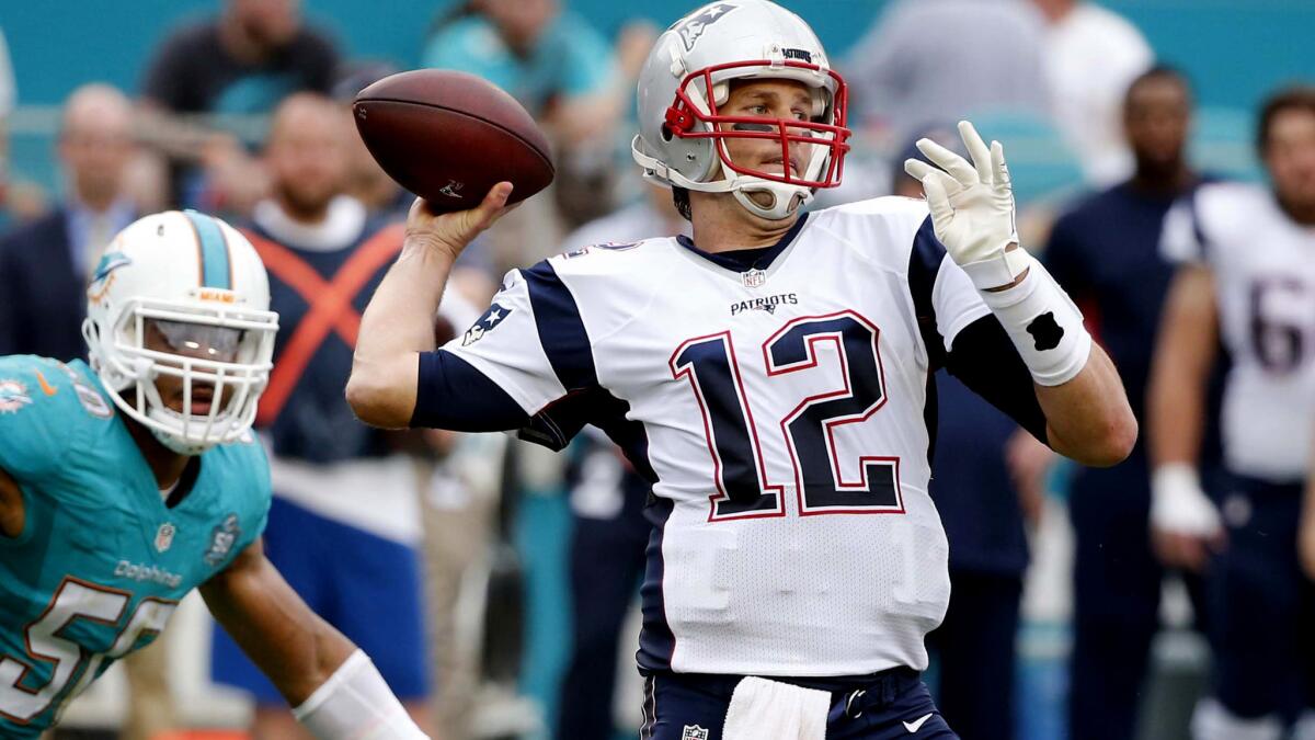 Quarterback Tom Brady (12) and the Patriots will be tested by a Chiefs team that has won 11 in a row, including a 30-0 win over the Texans in last week's playoff opener.