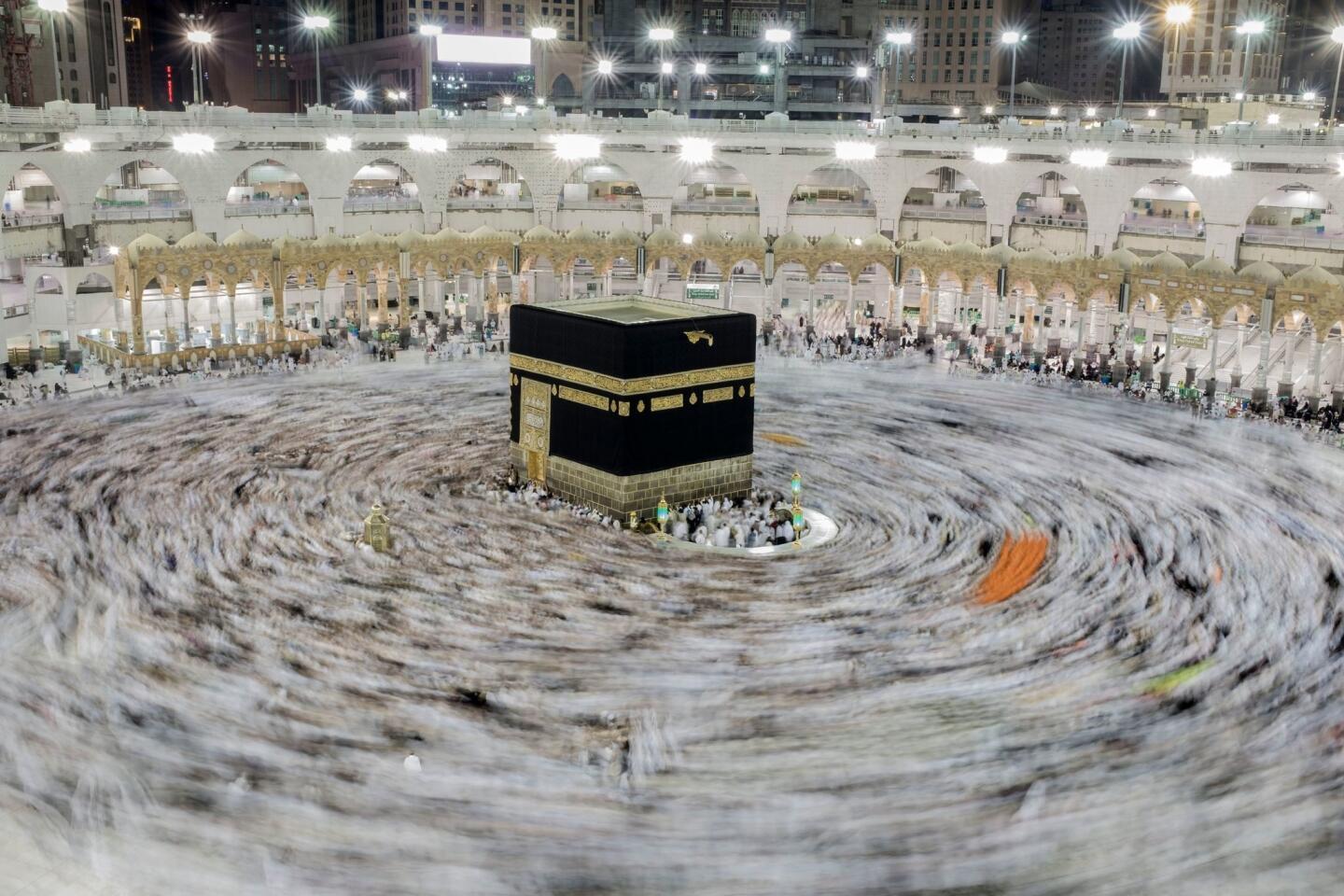 Saudi Arabia: Muslim pilgrims circumvent the Kaaba at the Grand Mosque on the first day of Eid al-Adha in Mecca.