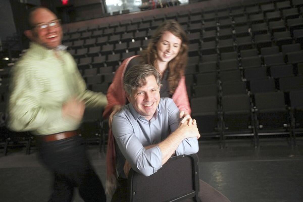 Director John Collins, center, is leading the helm of the Elevator Repair Service's production of "Gatz." Robert Cucuzza plays Tom and Kristen Sieh plays Catherine.