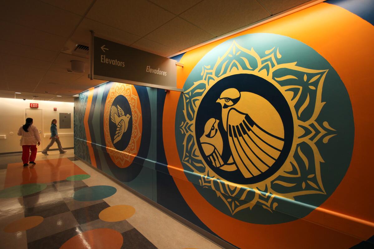 Personal information on more than 700 patients at L.A. County-USC Medical Center was breached when someone broke into a hospital employee's car and stole files. Above, mural in the hospital's pediatric wing.