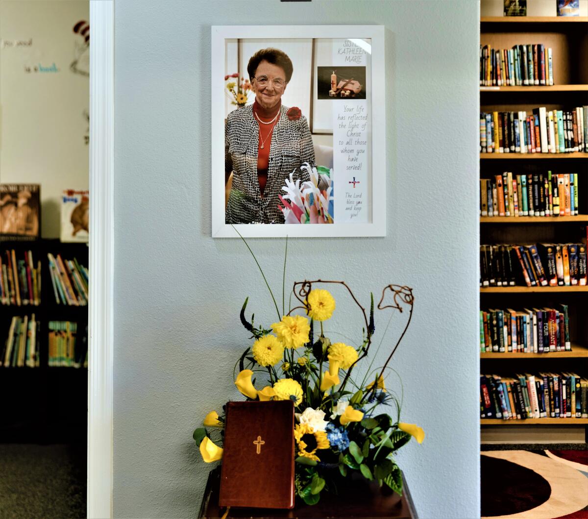 A portrait of Sr. Kathleen Marie Pughe hangs inside a new learning center created in the house in Costa Mesa.