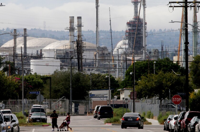 A refinery complex sits adjacent to a neighborhood in Wilmington.