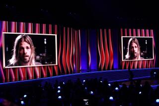 LAS VEGAS, NEVADA - APRIL 03: Drummer Taylor Hawkins is remembered with a tribute during the 64th Annual GRAMMY Awards at MGM Grand Garden Arena on April 03, 2022 in Las Vegas, Nevada. (Photo by Matt Winkelmeyer/Getty Images)