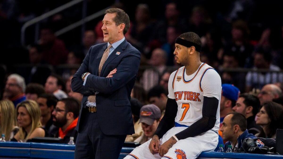 Knicks forward Carmelo Anthony, shown with Coach Jeff Hornacek, has been the subject of trade runors. One reported scenario had the Clippers acquiring Anthony in deal involving L.A. guards Jamal Crawford and Austin Rivers.
