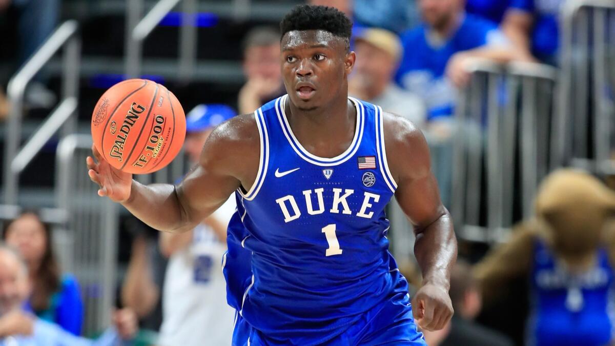 Duke's Zion Williamson dribbles the ball against Kentucky during the State Farm Champions Classic at Bankers Life Fieldhouse on Tuesday in Indianapolis.