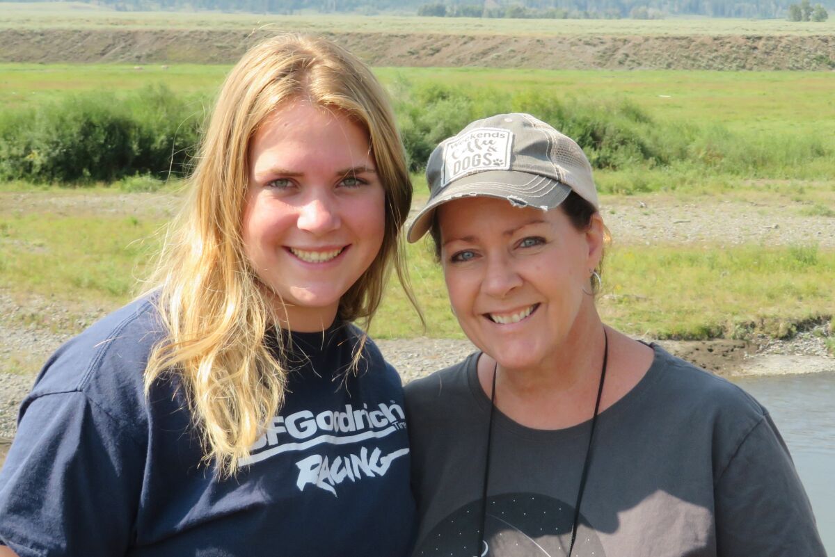 Breast cancer patient Stacey Nelson, right, is shown with her daughter, Morgan Nelson, on a Yellowstone National Park trip.