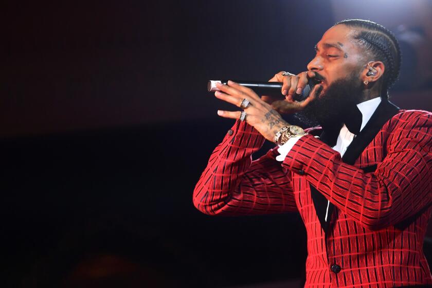 Rapper Nipsey Hussle was shot multiple times outside his Hyde Park store, Marathon Clothing Company. The Los Angeles native was transported to a nearby hospital and pronounced dead on March 31, 2019. LOS ANGELES, CA - FEBRUARY 07: Nipsey Hussle performs onstage at the Warner Music Pre-Grammy Party at the NoMad Hotel on February 7, 2019 in Los Angeles, California. (Photo by Matt Winkelmeyer/Getty Images for Warner Music) ** OUTS - ELSENT, FPG, CM - OUTS * NM, PH, VA if sourced by CT, LA or MoD **