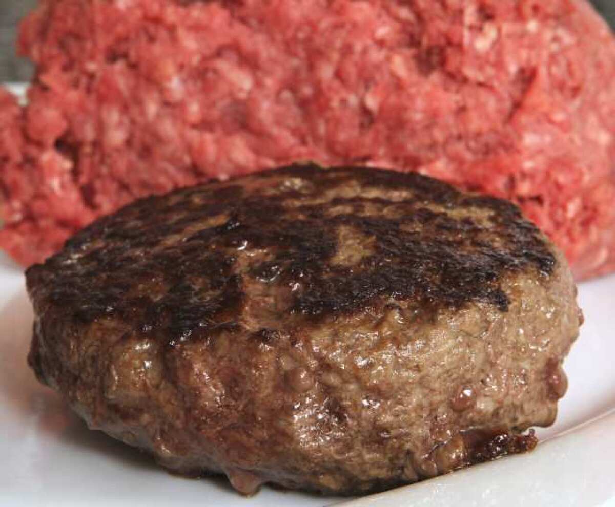 A hamburger made from ground beef containing what is derisively referred to as "pink slime." Despite the controversy, meat processor Tyson said its profit was up in the second quarter.