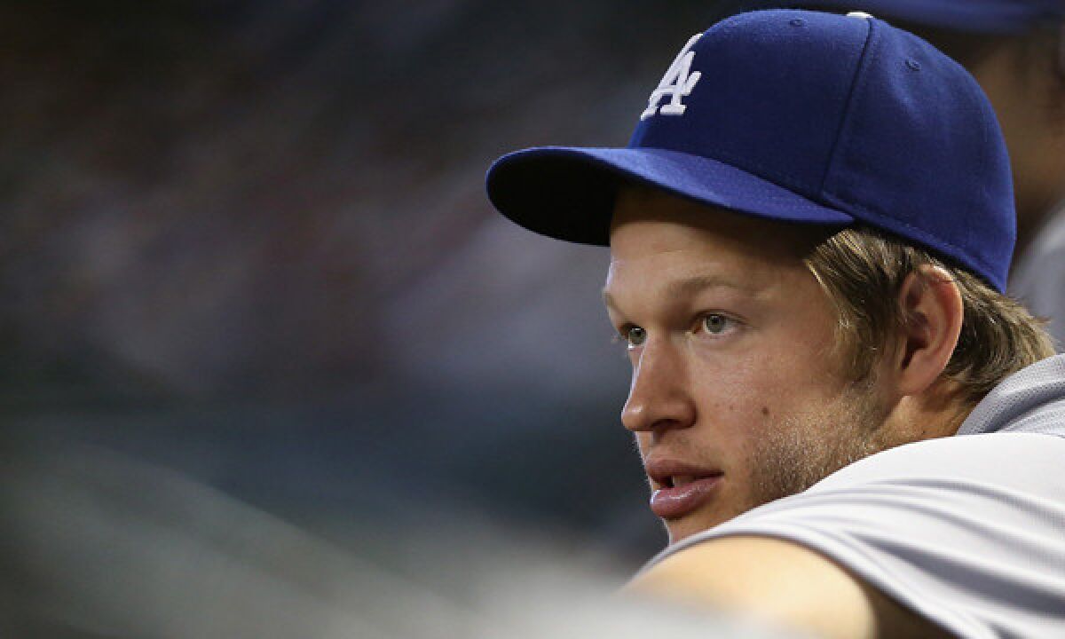 Dodgers pitcher Clayton Kershaw looks on during a game against the Arizona Diamondbacks on April 13. Kershaw has been on the disabled list since March 30 because of a back injury.