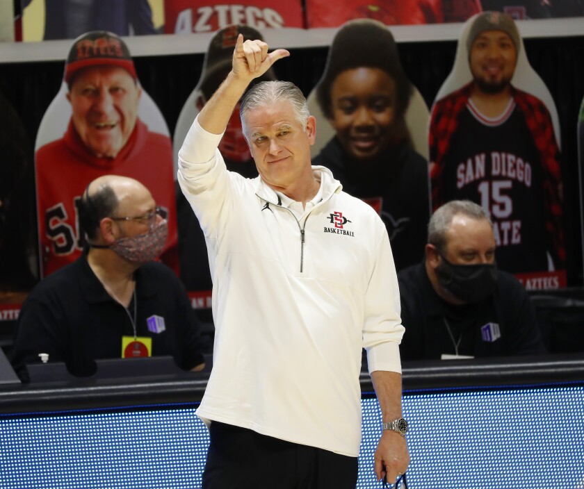 San Diego State coach Brian Dutcher and his Aztecs won 53 of their 60 games the last two seasons.