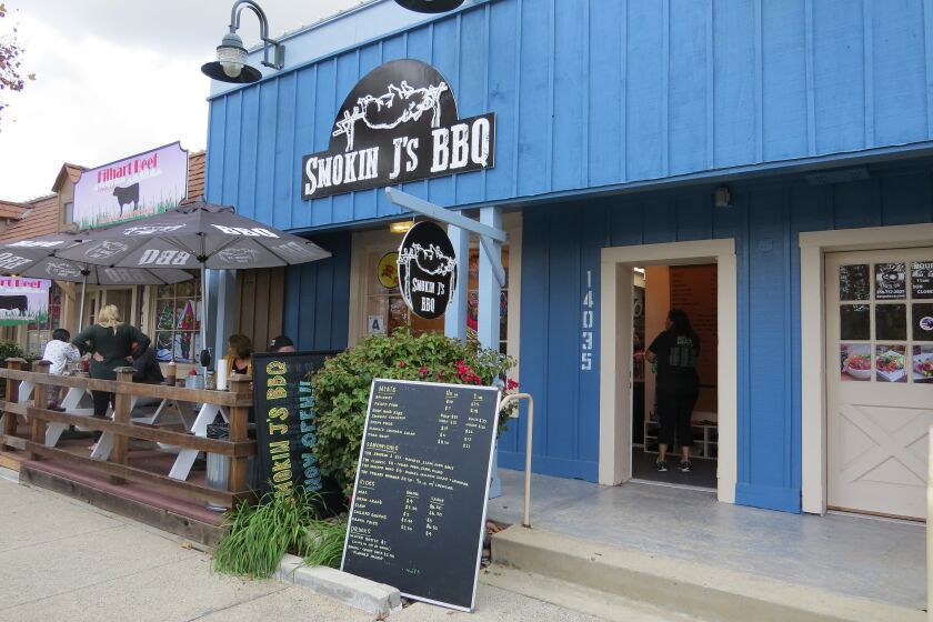 The exterior of Smokin J's BBQ, which opened Nov. 29 in the Old Poway Village Shopping Center.