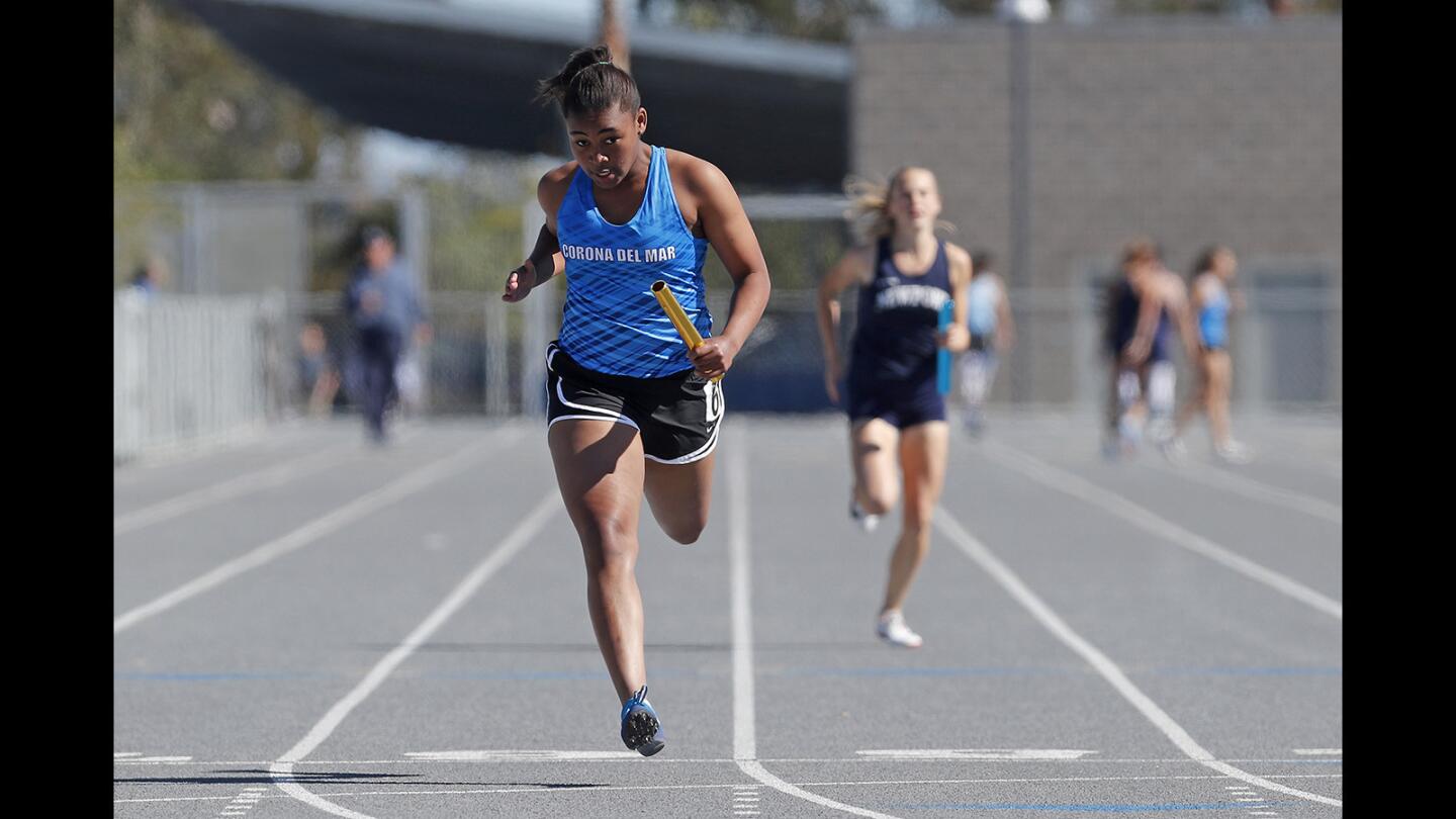 Corona del Mar High freshman Meghan Jordan finishes first in the girls' 400-meter relay during the Battle of the Bay track and field meet on Thursday, March 15.