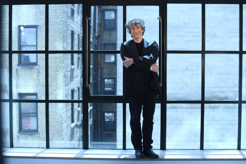 MANHATTAN, NEW YORK, MAY 23, 2019 Neil Gaiman, who created the comedic limited series Good Omens, about the bungling of Armageddon, is seen at The Whitby Hotel in Manhattan, NY. 5/23/2019 Photo by Jennifer S. Altman/For The Times