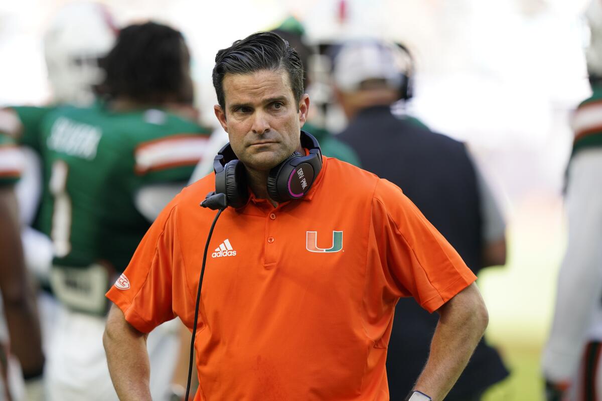 Miami coach Manny Diaz looks on as officials review a play against Georgia Tech on Nov. 6.