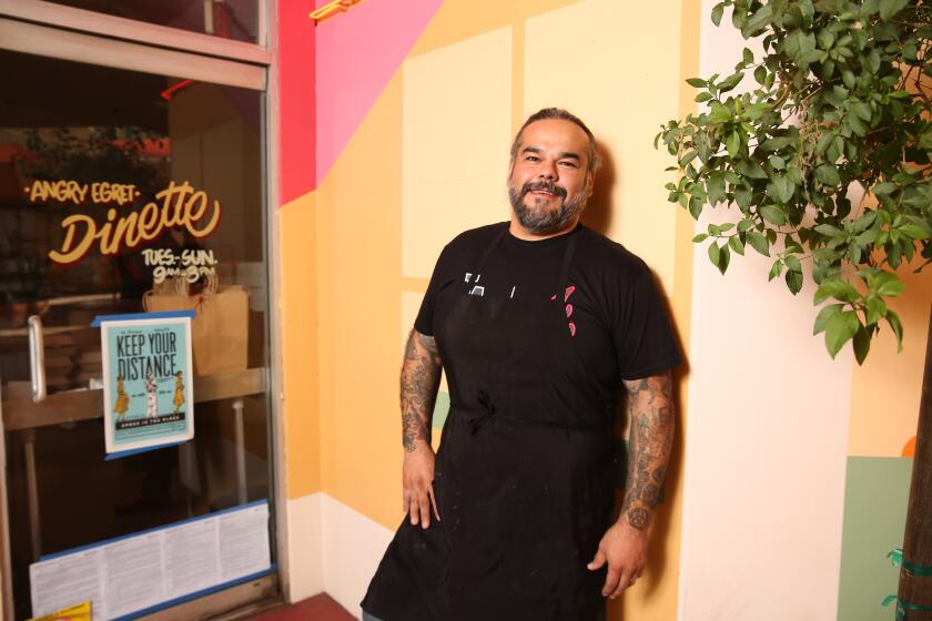 LOS ANGELES, CA - JANUARY 02: The Angry Egret Dinette's owner Wes Avila poses for a portrait at the restaurant in Chinatown on Saturday, Jan. 2, 2021 in Los Angeles, CA. The establishment is one of Los Angeles Times' best new restaurants of 2020. (Dania Maxwell / Los Angeles Times)