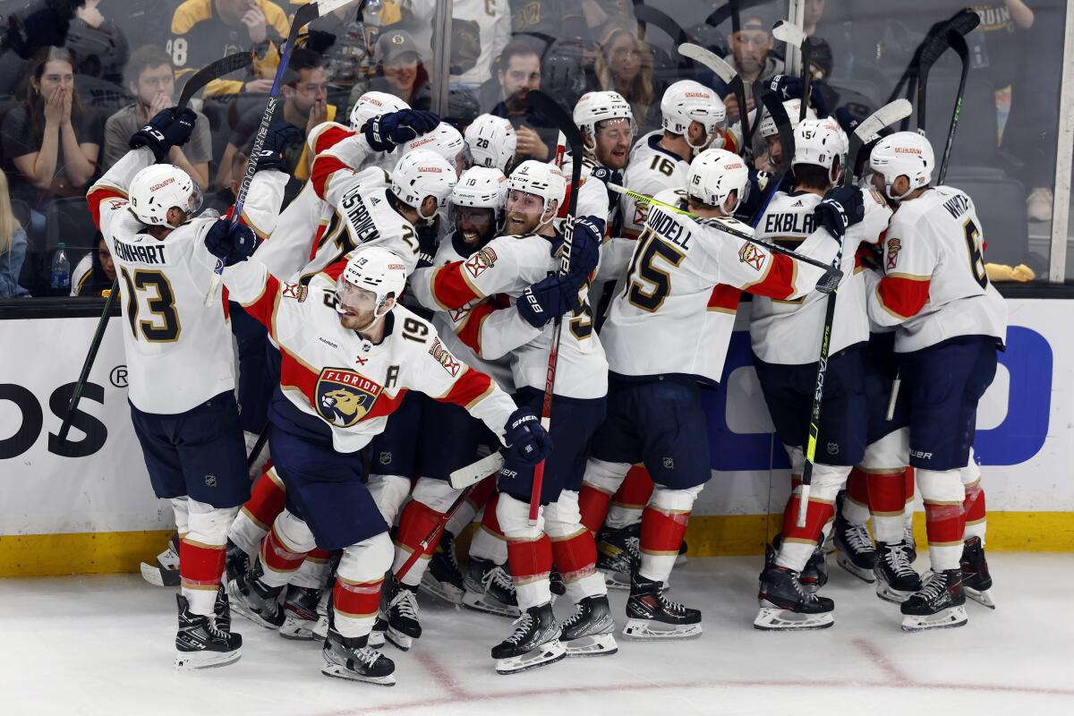 The Florida Panthers celebrate after defeating the Boston Bruins on a goal by Carter Verhaeghe.