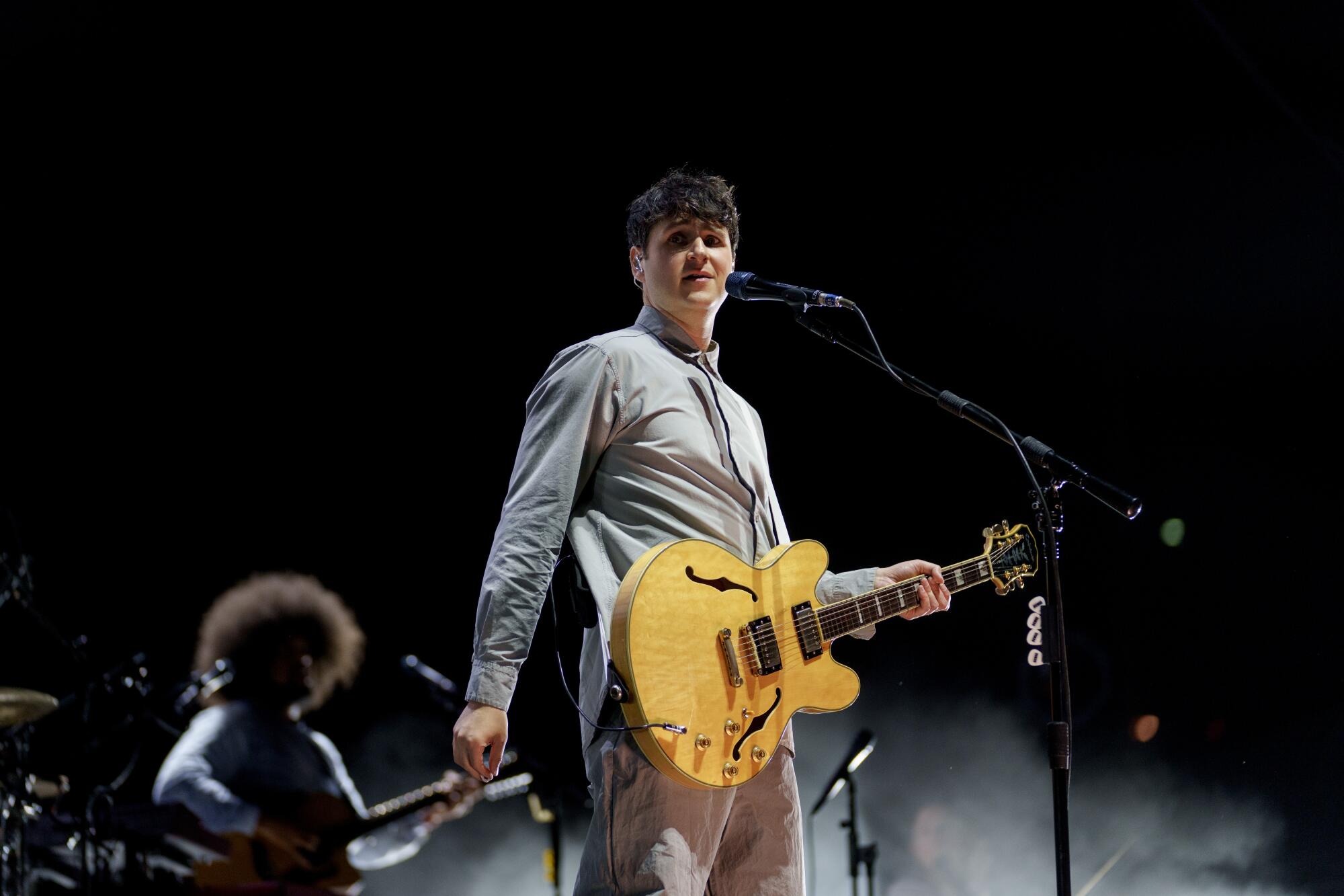 Ezra Koenig of Vampire Weekend occurs.