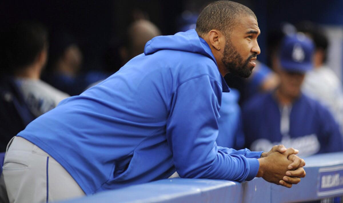 Center fielder Matt Kemp watches the Dodgers play the Blue Jays during a game last month in Toronto.