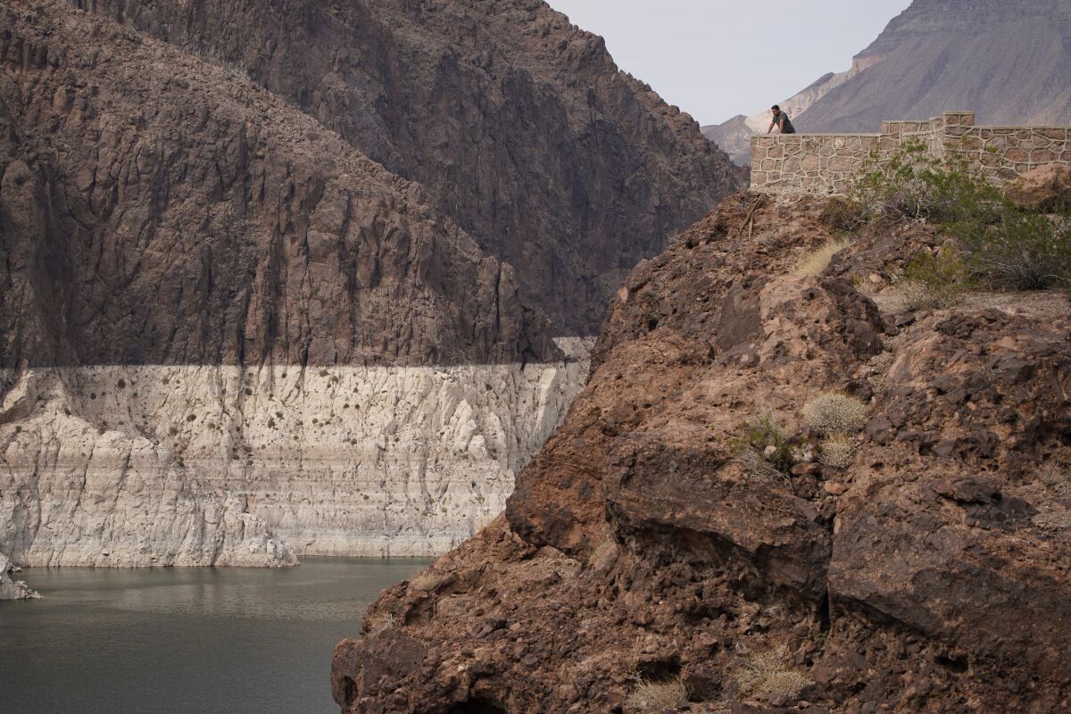 A person looks out over Lake Mead near Hoover Dam